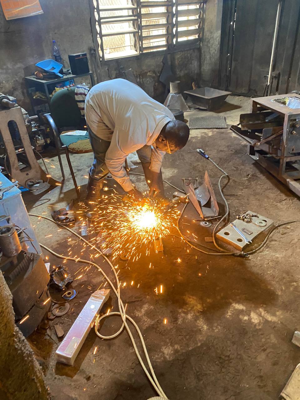 Metal fabrication with sparks flying