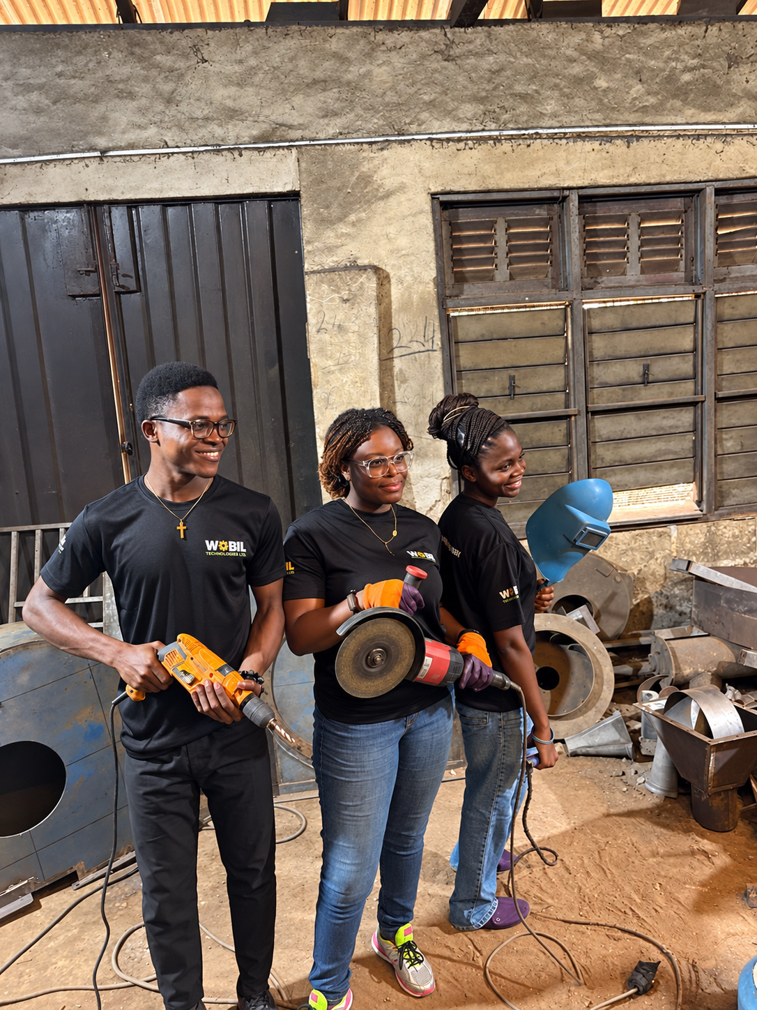 Wobil team members with their fabrication tools